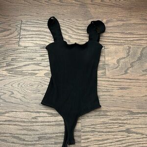 Pookie and Sebastian black ruffle body suit